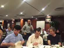 Bingwei Lu speaking Yuanquan Song, Tongfei Wang, Bruce Hay in foreground