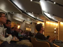 Yanmeng Guo, WooJae Kim and Bruce Hay in the audience